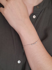 Pulsera bolitas y estrellas