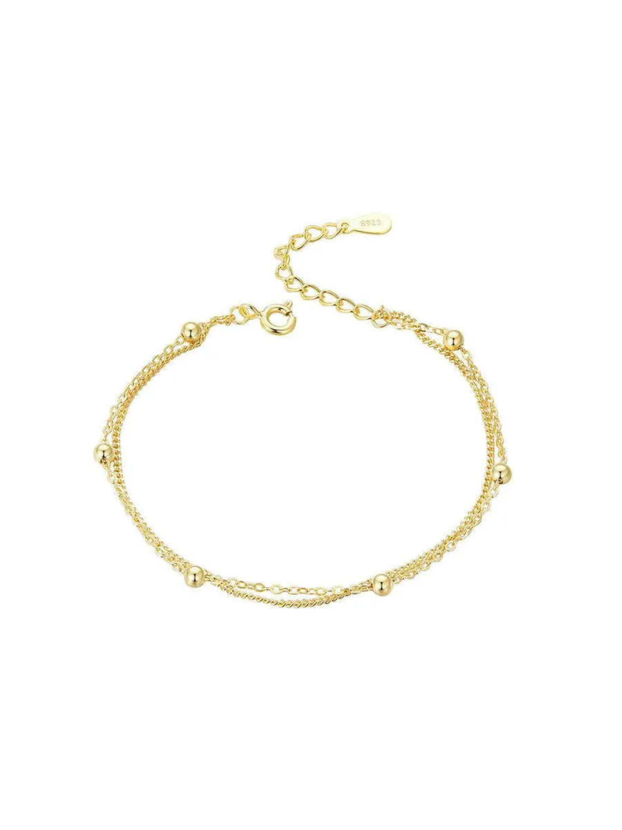 Pulsera doble bolitas oro